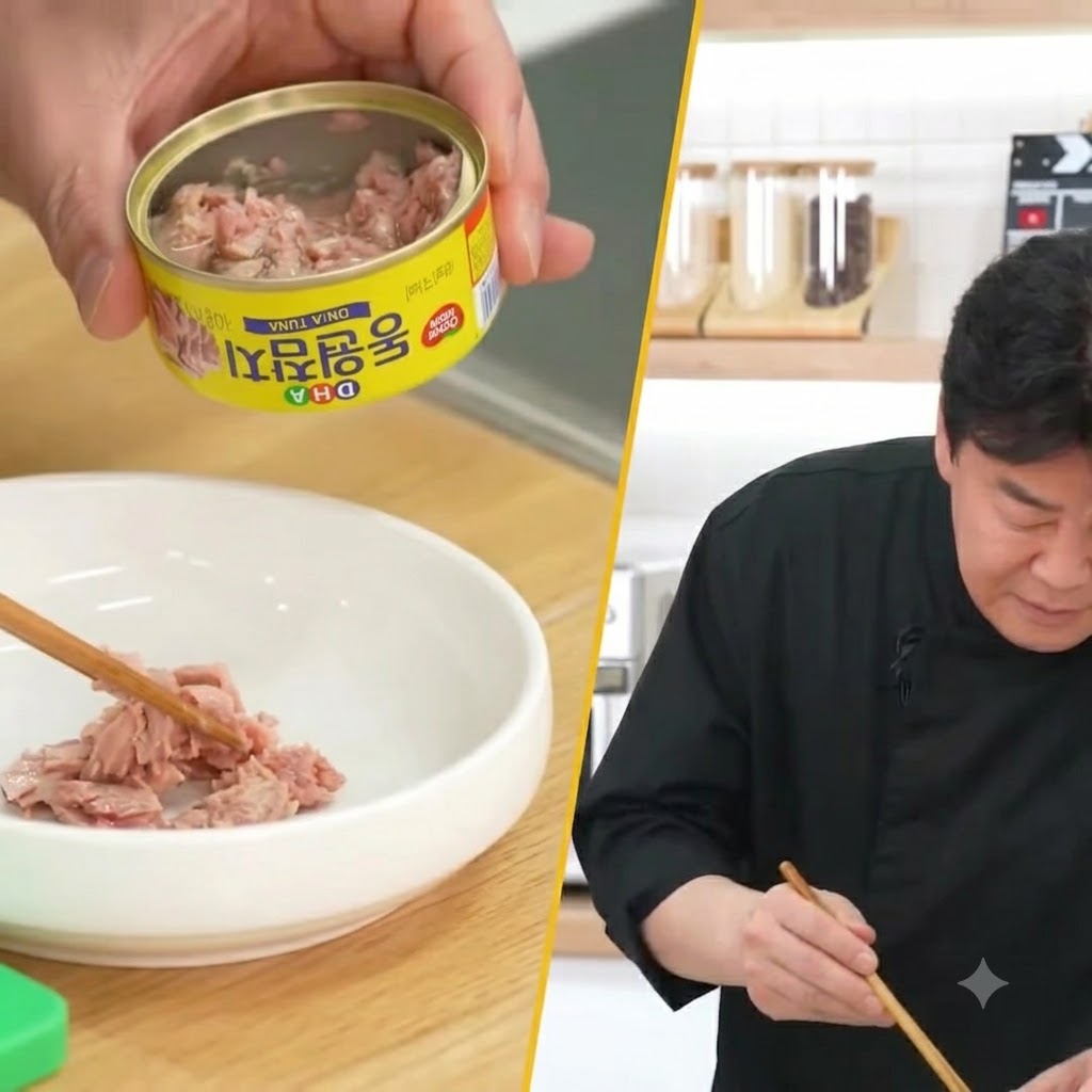 젓가락을 이용해 참치 반 캔을 덜어내어 빈 그릇에 담고 있는 모습.
